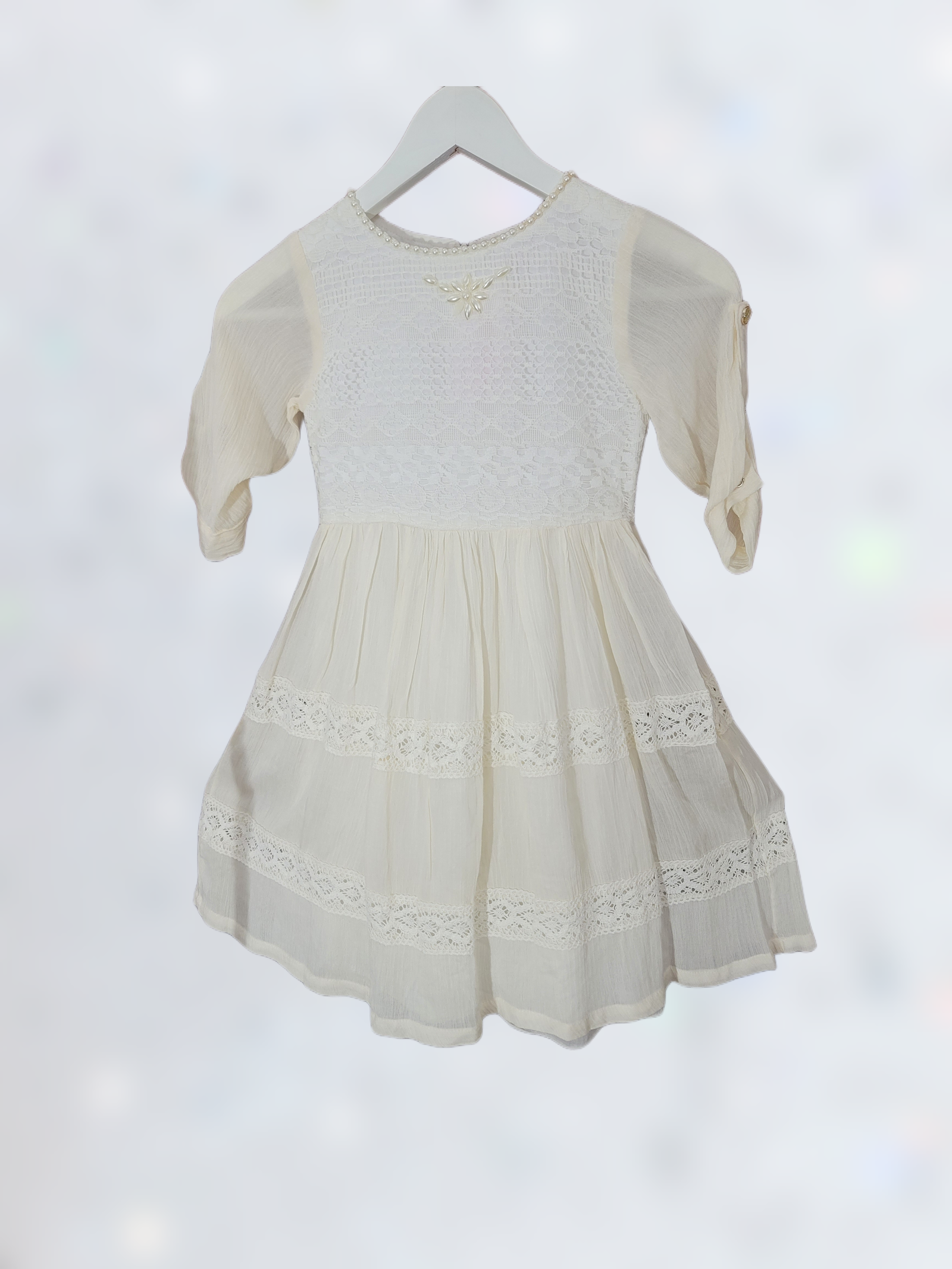A White-colored frock with an elegant design