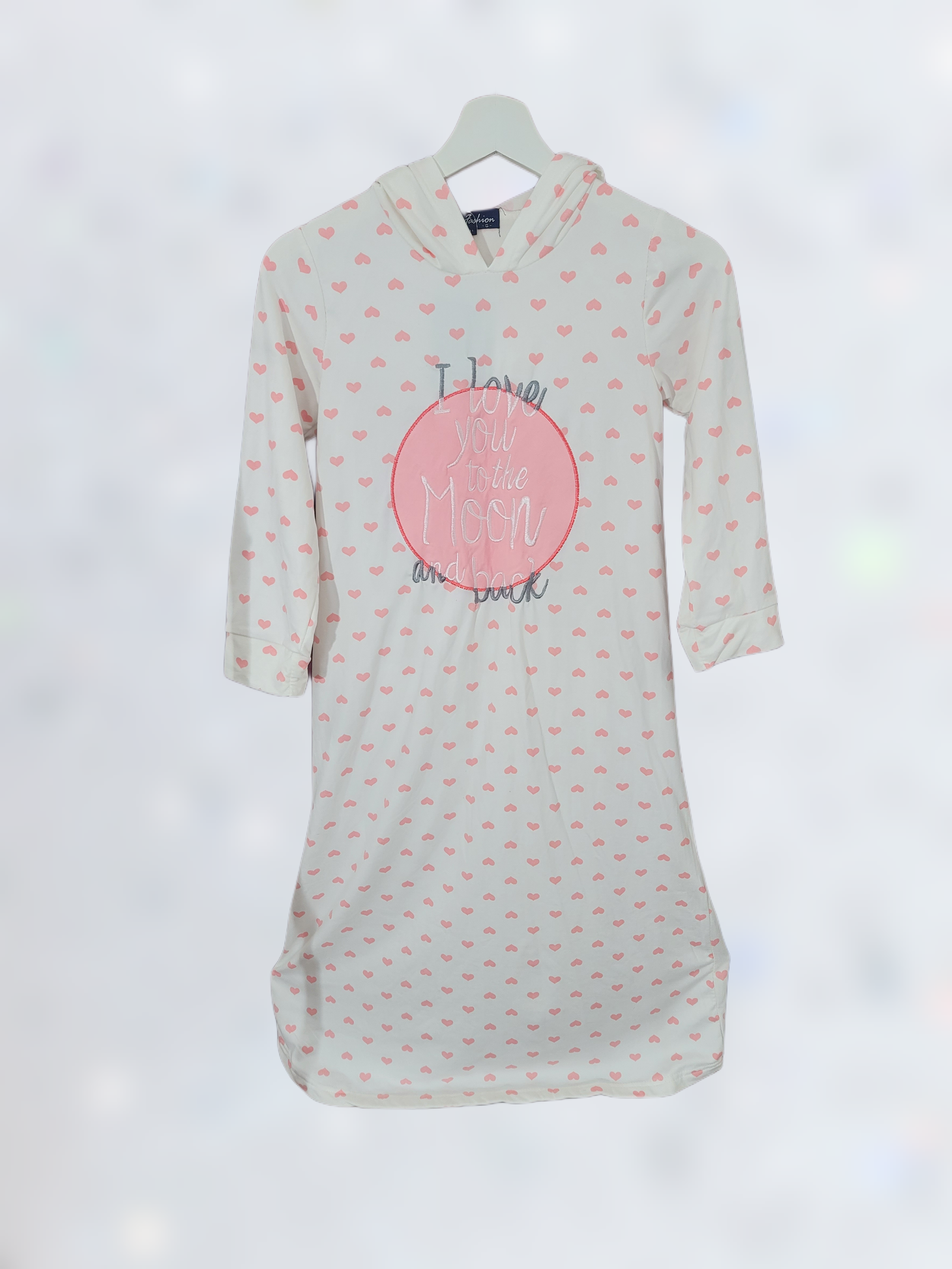 A white frock adorned with charming heart designs