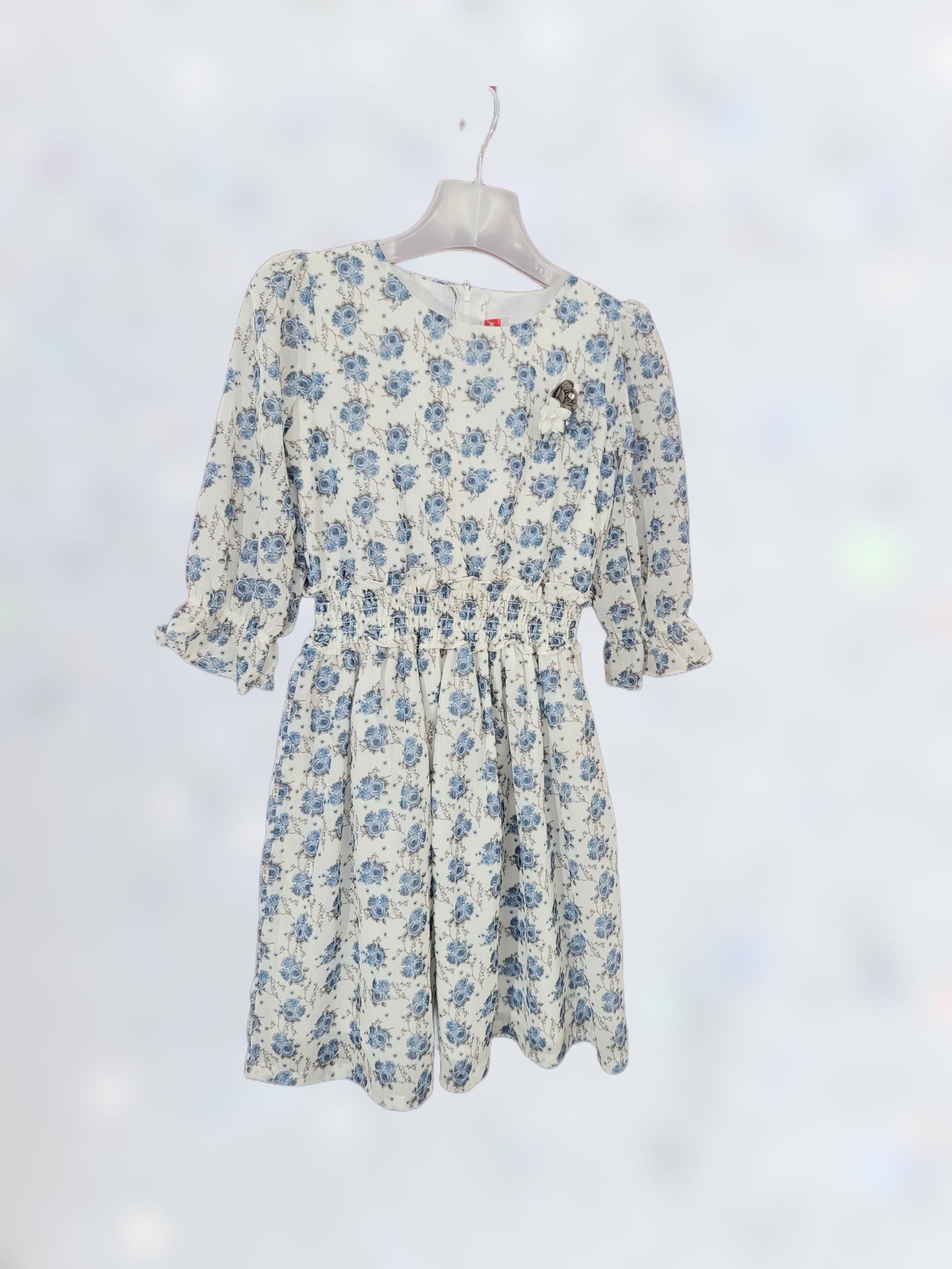 Pure White Frock Adorned with Delicate Sky Blue Flower Prints